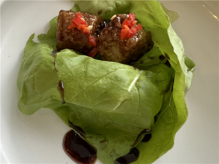 black cod with vinegar and lettuce
